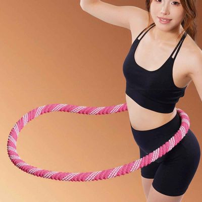 Hula hoop Rollo – visuel hula hoop rose sur taille de femme- Soiflex