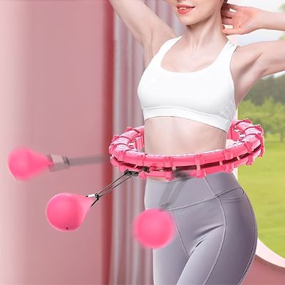 Hula hoop SlimTech – Léger et tonifiant pour abdos -femme avec son hula hoop rose a la taille Soiflex